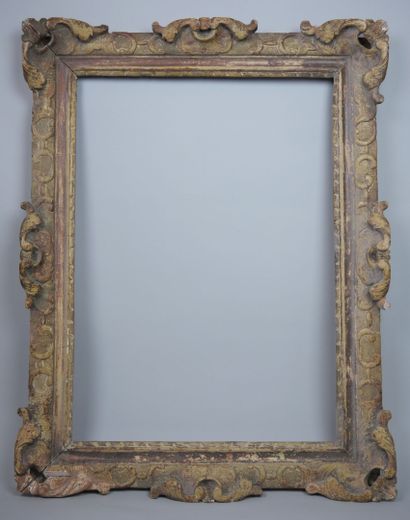 Rectangular frame in carved and patinated...