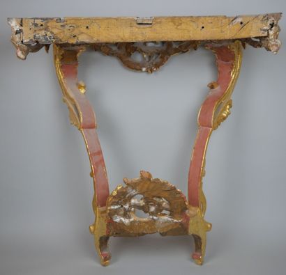 null Carved and gilded wood console, with openwork decoration in the center of an...
