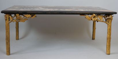 null Rectangular coffee table, the top in black marble with inlaid polychrome marbles...