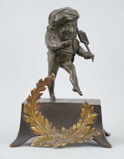 null Proof in bronze with a brown-green patina representing a dancing elf.

19th...