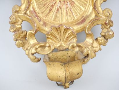 null Carved and gilded wood stoup.

Eighteenth century period.

(Receptacle reported).

37...
