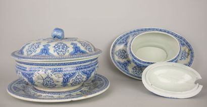 null GIEN 

Part of earthenware service with blue white decoration of foliage, monogrammed...