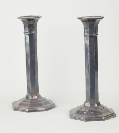 null Pair of silver torches with cut sides (?).

Foreign work, 20th century.

(Deformations).

H...