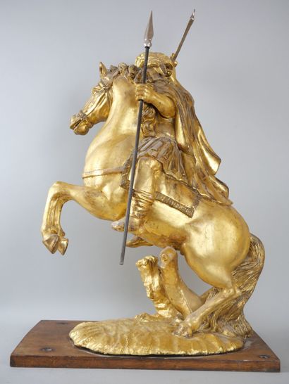 null Sculpture in gilded wood, representing Saint George slaying the dragon.

Probably...