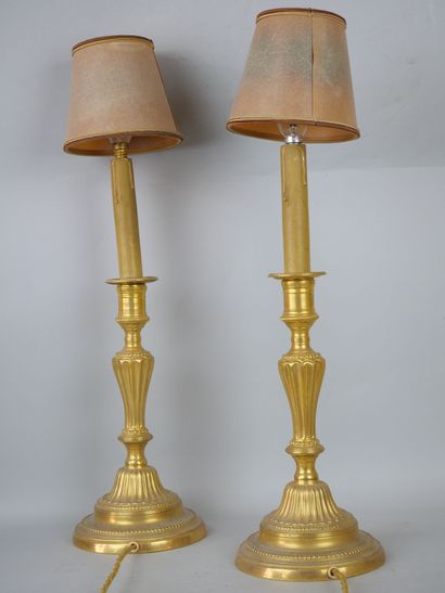 null Pair of gilt bronze torches.

Louis XVI style, 19th century.

(Drilled for electricity,...