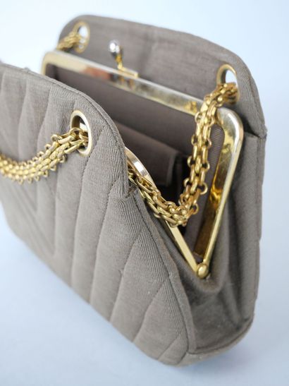 null CHANEL 

Evening bag in khaki fabric with herringbone pattern, the interior...