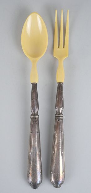 null Silver salad servers 925 thousandths, the handles filled with decoration of...