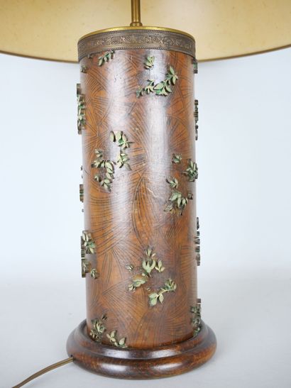 null Cylindrical lamp stand made of a roll of painted paper with a decoration of...