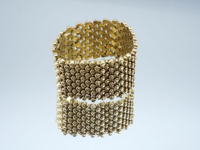 null Large flexible cuff bracelet in gold 750 thousandths with decoration of balls....