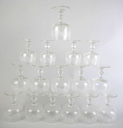 null Set of 10 wine glasses and 12 water glasses in crystal engraved with a frieze...
