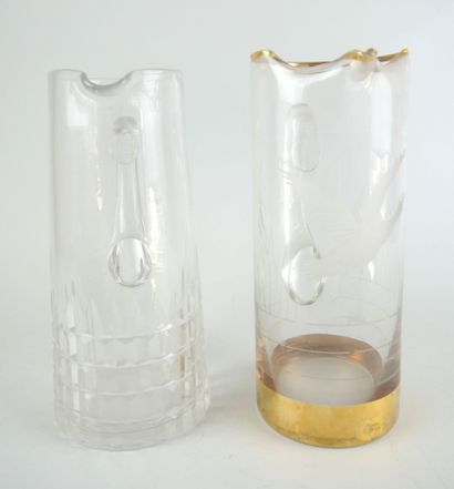 null Set of two orangeade pitchers, one in glass with engraved bird decoration and...