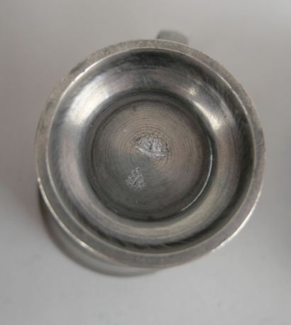 null Set of four pewter pieces including:

- a green tinted glass and pewter bowl,...