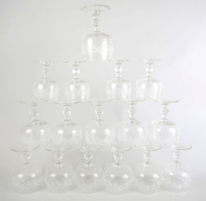 null Set of 10 wine glasses and 12 water glasses in crystal engraved with a frieze...