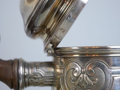 null Silver coffee pot 925 thousandths resting on a tripod base decorated with shells,...