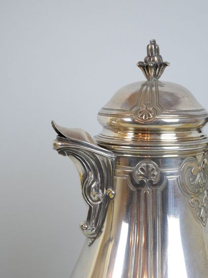 null Silver coffee pot 925 thousandths resting on a tripod base decorated with shells,...