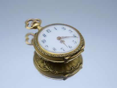 Petite montre de col en or 750 millièmes,...