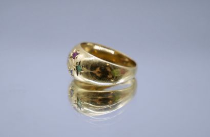 null Ring in gold 750 thousandth paved with small colored stones and a diamond.
Gross...
