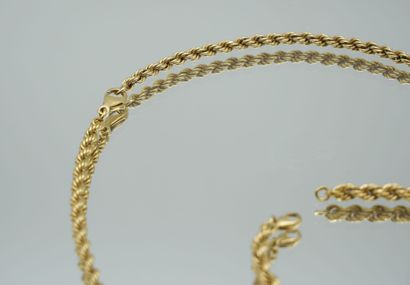 null Half set in gold 750 thousandths including a necklace and a bracelet with twisted...