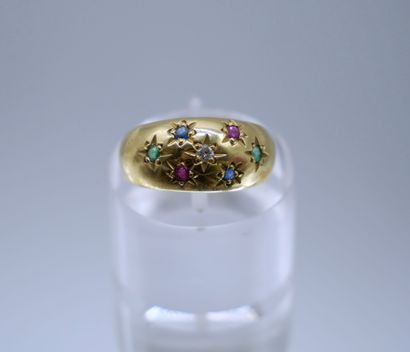 null Ring in gold 750 thousandth paved with small colored stones and a diamond.
Gross...