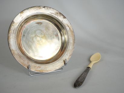 null Small plate with boiled and its spoon out of silver 925 thousandths. 
Diameter...