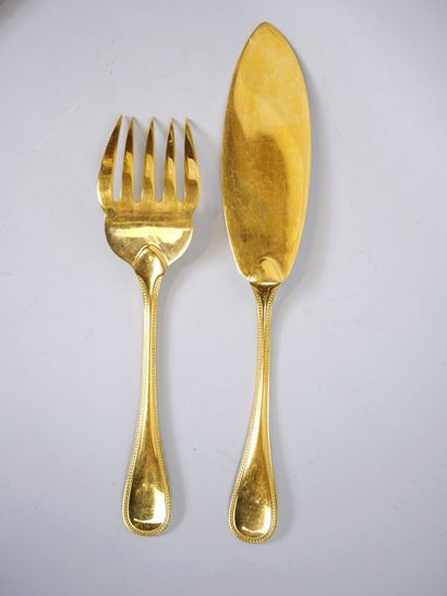 null CHRISTOFLE
Fish service in gilded metal including 12 place settings and a serving...