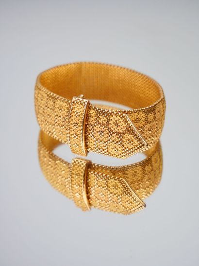 null Bracelet ruban en or 750 à maille souple à motif de vannerie et fermoir boucle....