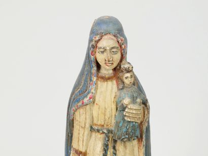 null Vierge à l'enfant en bois sculpté et peint 
Travail Philippin
Hauteur : 32 cm
Hauteur...