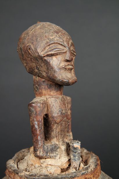 null DEMOCRATIC REPUBLIC OF THE CONGO 
Figure of power in carved wood, terra cotta,...