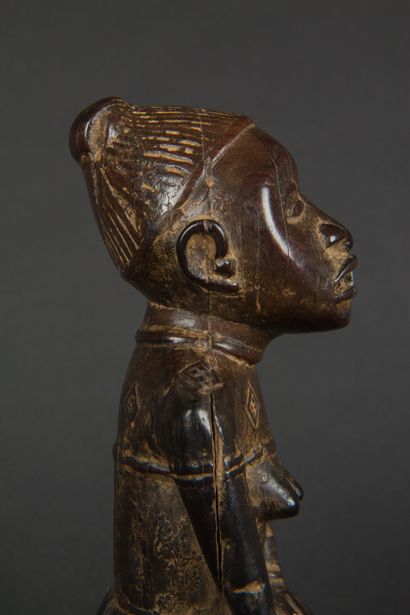null REPUBLIQUE DEMOCRATIQUE DU CONGO 
Figure féminine sur une tortue en bois sculpté
Kongo
Début...
