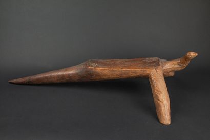 null BURKINA FASO 
Tripod seat representing a stylized animal in carved wood 
Lobi
Carved...