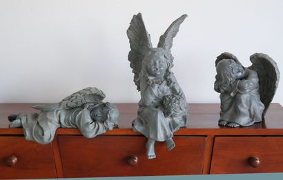 Set of 3 decorative cherubs in resin
The...
