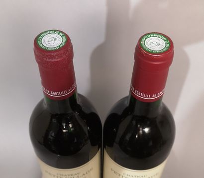 null 2 bouteilles de Château PETIT VILLAGE - Pomerol 1994