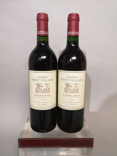 null 2 bouteilles de Château PETIT VILLAGE - Pomerol 1994