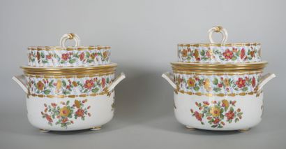 null In the Sèvres taste:
Two porcelain covered coolers and their lining forming...