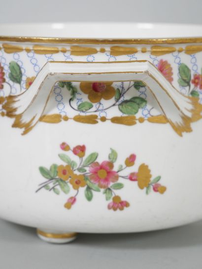 null In the Sèvres taste:
Two porcelain covered coolers and their lining forming...