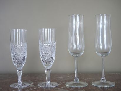Suite of 10 engraved crystal champagne flutes...
