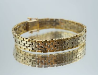 null Ribbon bracelet in two-tone 750 thousandths gold with geometric mesh. 
Length:...