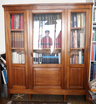 null Beachwood bookcase opening with 3 glass doors in the upper part and solid doors...