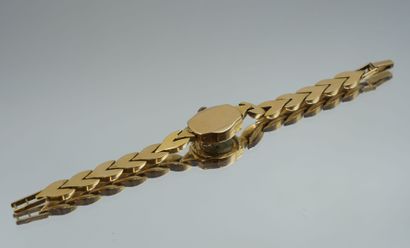 null Ladies' wristwatch in 750-thousandths gold, round case, Arabic numerals and...