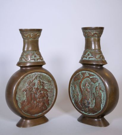 null CHINA 
Pair of gourd-shaped vases in green patina bronze decorated with sages...