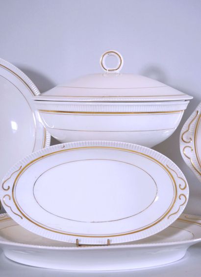 null LIMOGES 
Part of a white porcelain dinner service decorated with a gilded fillet...