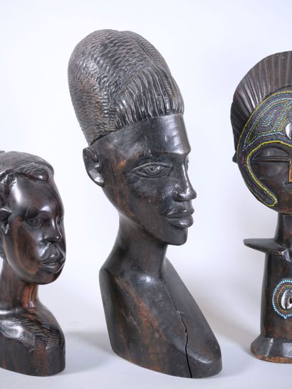 null AFRICAN ART 
Reunion of 6 black stained wood subjects representing a giraffe,...