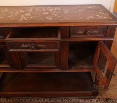null Sideboard opening with three drawers in the waistband, three glass doors resting...