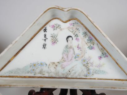 null CHINA 
Suite of 7 triangular porcelain dishes with polychrome decoration of...