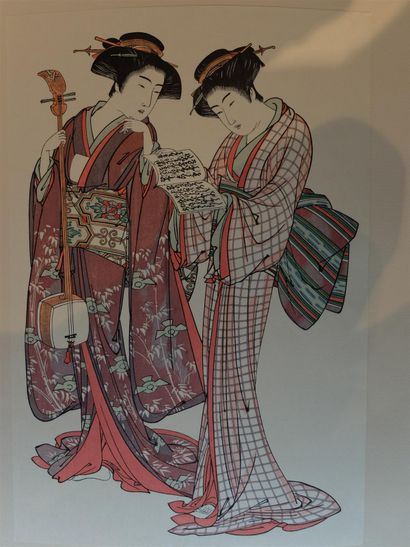 null Deux dames de compagnies. 

Estampe.

Japon, époque XXe siècle.

39 x 26,5 cm....