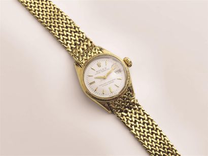 null ROLEX. Montre bracelet de dame, en or (750/1000e), la montre de forme ronde,...