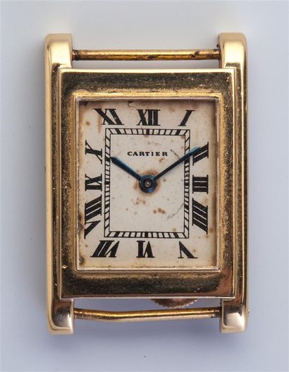 null CARTIER.
Boîtier de montre rectangulaire de modèle "Tank" en or jaune 18k (750/1000e),...