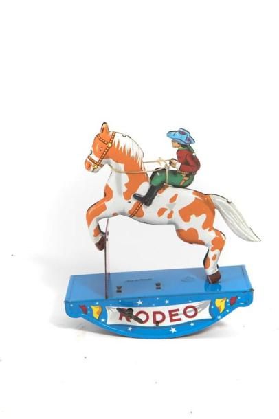 null "Rodéo"
Cow-boy à cheval, jouet en tôle lithographiée à mécanisme d'horlogerie.
Joustra-France,...
