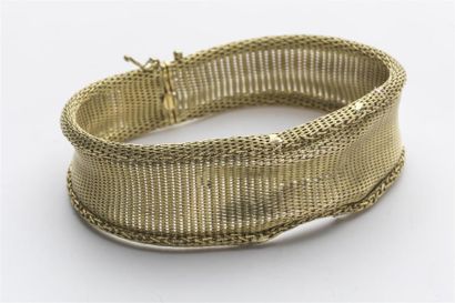 null Bracelet souple en or jaune 750 millièmes à mailles tissées. 
Poids : 38,4 g....