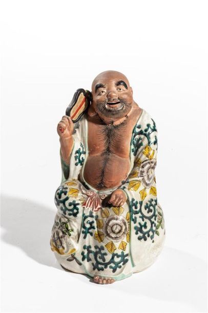 null CHINE XXème
Bouddha à l'écran en terre cuite polychrome 
Haut: 23 cm